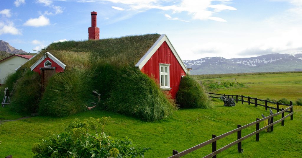 Grass roofed houses of the Icelandic countryside we get to visit on our road trip through the country