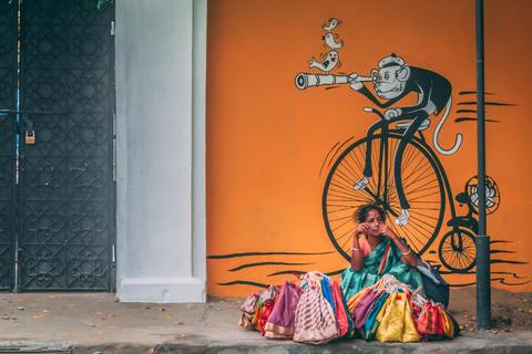 Artisitic graffiti and colourful locals seen on our Pondy experience